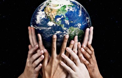 Hands holding Earth
